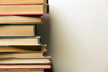 Stack of old books on a white background