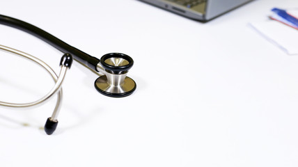 Stethoscope on doctors table, Stethoscope closeup