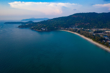 Aerial drone view of tropical Kamala Beach area and Andaman Sea in Phuket, Thailand