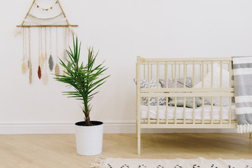 Close up of child's crib in a beautiful nursery room