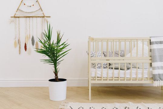 Close Up Of Child's Crib In A Beautiful Nursery Room