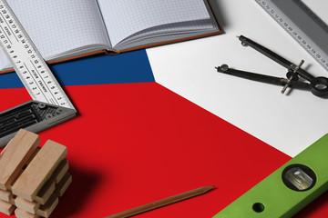 Czech Republic national flag on profession concept with architect desk and tools background. Top view mock-up.