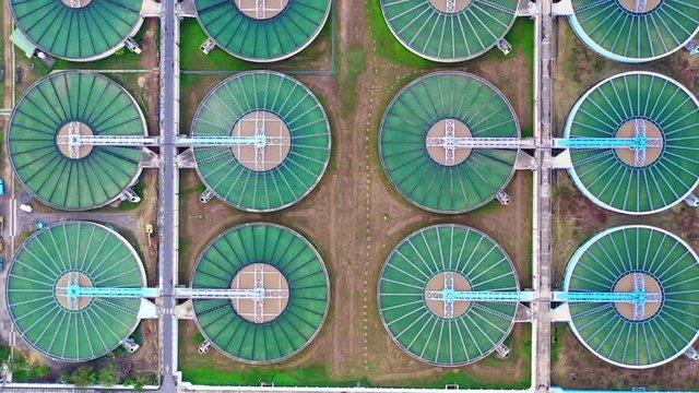 4k, Aerial footage Water treatment solution, Industrial water treatment&lrm;, Aerial top view recirculation solid contact clarifier sedimentation tank, Ecosystem and healthy environment concept.