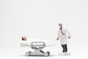 Simple Conceptual Photo, Mini figure doctors and nurses mini figure evacuation of infected patients