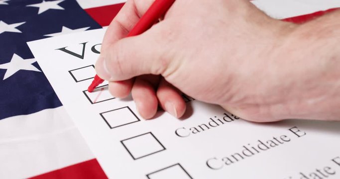 Voting for Presidential elections 2020 with ballot on American flag.