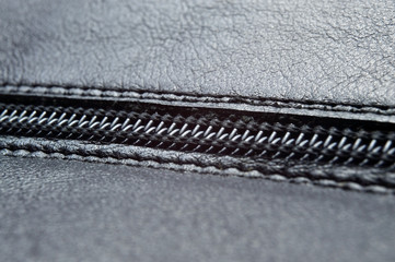 Lightning on a black leather texture.