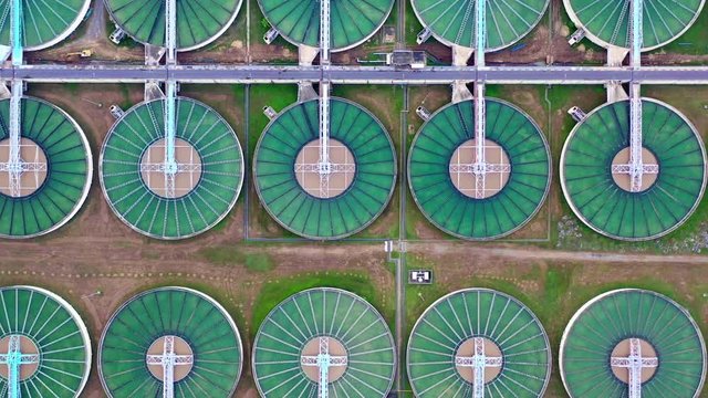 4k, Aerial footage Water treatment solution, Industrial water treatment&lrm;, Aerial top view recirculation solid contact clarifier sedimentation tank, Ecosystem and healthy environment concept.