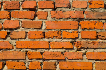 Obraz premium Part of a red brick wall.Texture.Background.Photo.