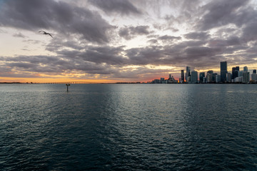 Miami skyline at sunset, seen from the sea.