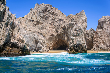 Cave inside rock formation on a beach without people in Cabo San Lucas, Mexico