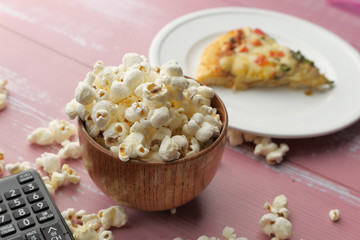 Weekend at home, leisure lifestyle concept with popcorn and pizza 