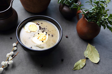 White borscht with egg. Traditional Easter dish. Traditional Easter dishes, serving suggestions, culinary photography.
