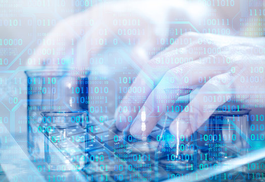 Close up of scientist's hands working on  laptop computer. Laboratory transparent glassware instruments. Empty equipment for chemical lab in realistic style.