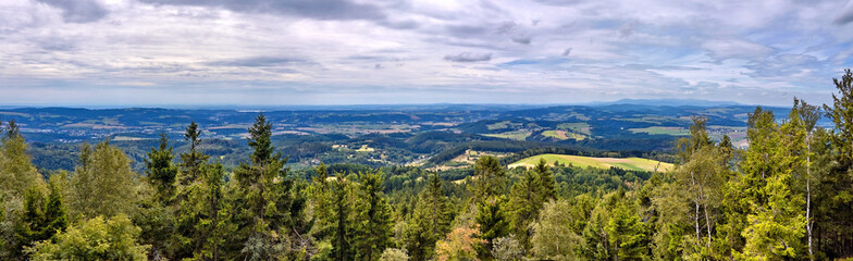 Panoramic view towards Karkonosze Mountains (Right) from Errant Rocks (Błędne Skały) located in the Table Mountains National Park, Poland © PatPat