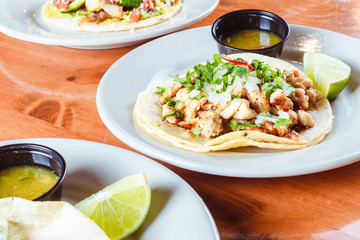 Taco platter and sauce at a traditional mexican restaurant