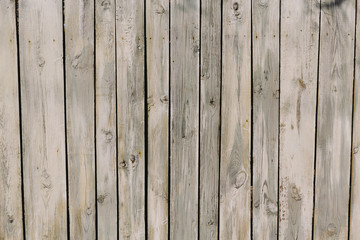 Closeup rough wooden old fence. Beauty wooden background.