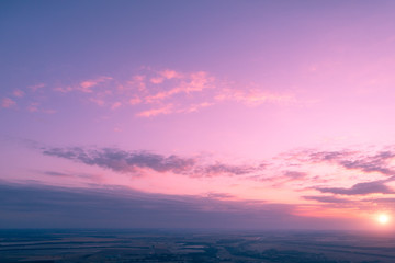 Colorful cloudy sky at sunset. Gradient color. Sky texture, abstract nature background