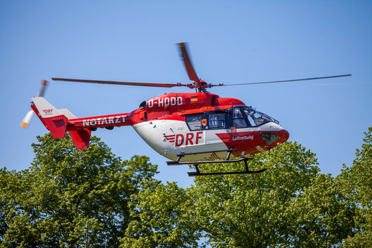 DELMENHORST / GERMANY - MAY 06, 2018: Eurocopter BK-117 from DRF Luftrettung flies over landing side. Notarzt means emergency doctor.