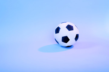 Fototapeta na wymiar Soccer ball isolated on blue background