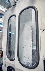 toughened glass blast shield doors in a manufacturing factory. glass doors to contain spray paint and sand blasting industry. Futuristic science fiction style space station protective door hatch.