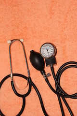 A dot on a peach background. Medical device.