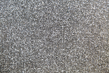 The background of the protective coating is slate grey on the surface of the waterproofing material. Construction, background, textures, design.