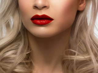Sexual full lips. Natural gloss of lips and woman's skin. The mouth is closed. Increase in lips,...