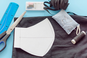 how to make a protective face mask at home from fabric, creating a markup pattern for sewing a mask, step-by-step instructions, step 2