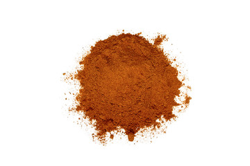 Cinnamon powder isolated on white background. Top view. Pile of cinnamon