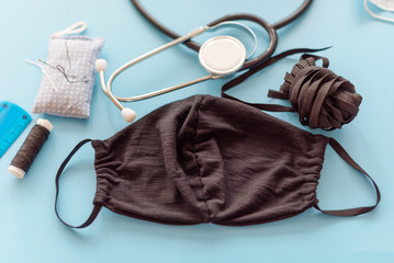 how to make a protective face mask at home from fabric, creating a markup pattern for sewing a mask, step-by-step instructions