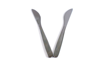 Dessert knives on a white background