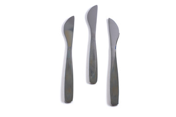 Dessert knives on a white background