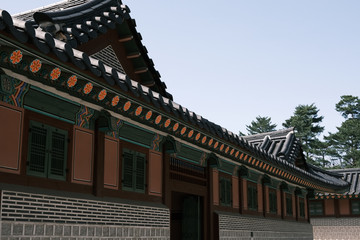 Fototapeta na wymiar Kyeongbokgung Palace (Main Royal Palace of Joseon Dynasty) and its architectural patterns