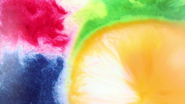 Multi Colour Inks mix in white milk. Abstract Colorful Paint Liquid Artistic Movement. Beautiful spread of Colored paint in liquid, realtime shot.