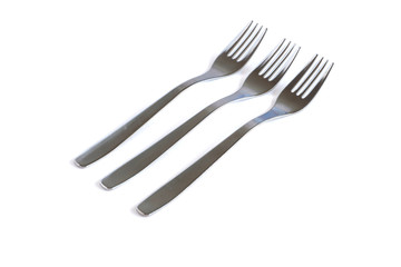 Dessert forks on a white background