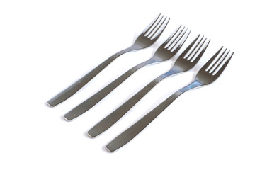 Dessert forks on a white background