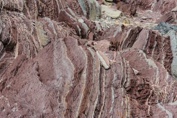 Colourful rocks in east Greenland close up. Rock texture.