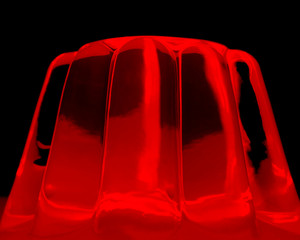 Red gelatine on a black background