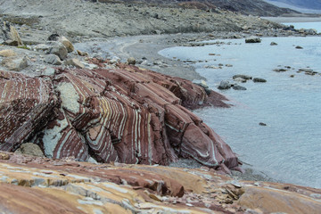 Colourful rocks in east Greenland close up. Rock texture.