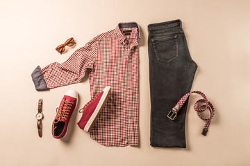 Men's casual fashion outfit - jeans, plaid shirt and red sneakers