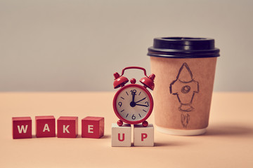 Beginning startup. Awakening. Morning coffee. New beginnings. Wake up inscription. Alarm clock,...