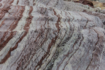 Colourful rocks in east Greenland close up. Rock texture.
