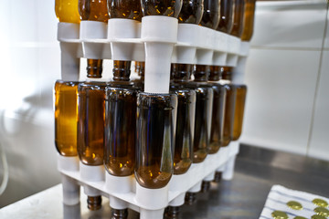 Beer bottles put into machines to be cleaned