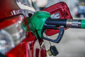 Fuel Filling At Gas Station, red car