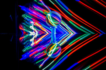 3D rendering or 3D illustration. Images with colored lights on a dark background. Abstract art concept with colored lights.