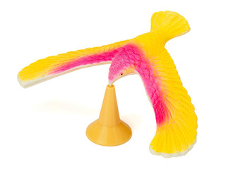 Balance bird on a white background, educational toy