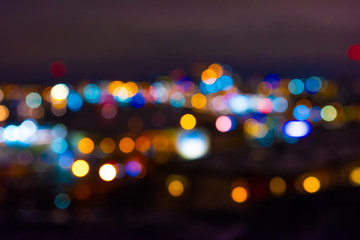 Out of focus lights of a city at night.