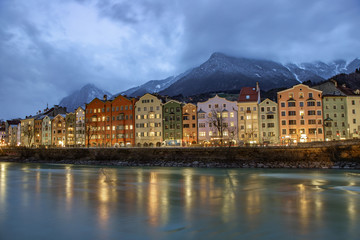 Night view of the Innsbruck promenade overlooking the mountains