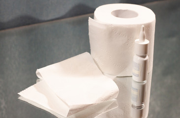 toilet paper and nose drops