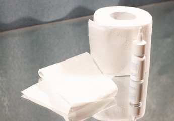 toilet paper and nose drops